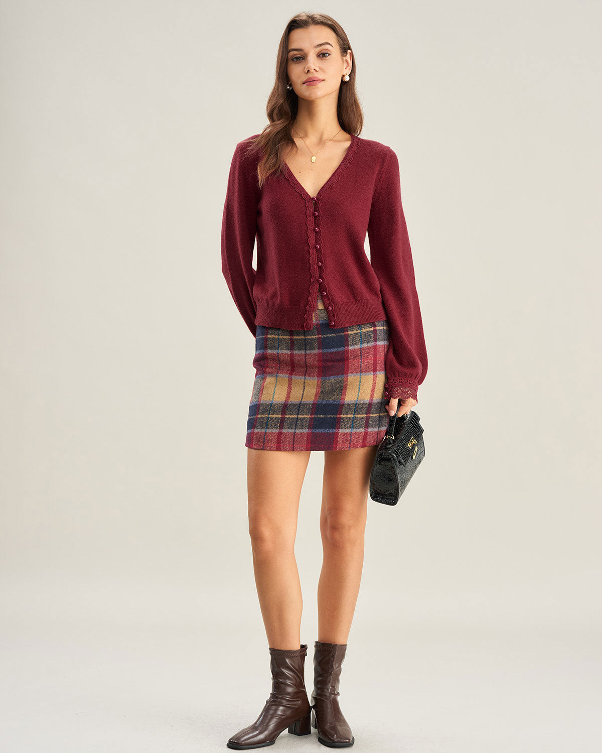 DALIA - Rood gebreid vest met V-hals en kanten afwerking