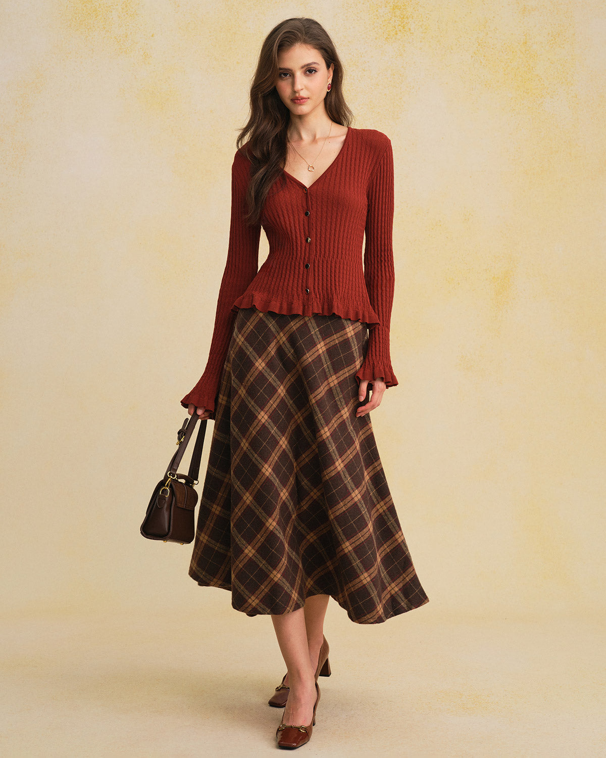 DALIA - Bruin gebreid vest met V-hals en wijde mouwen