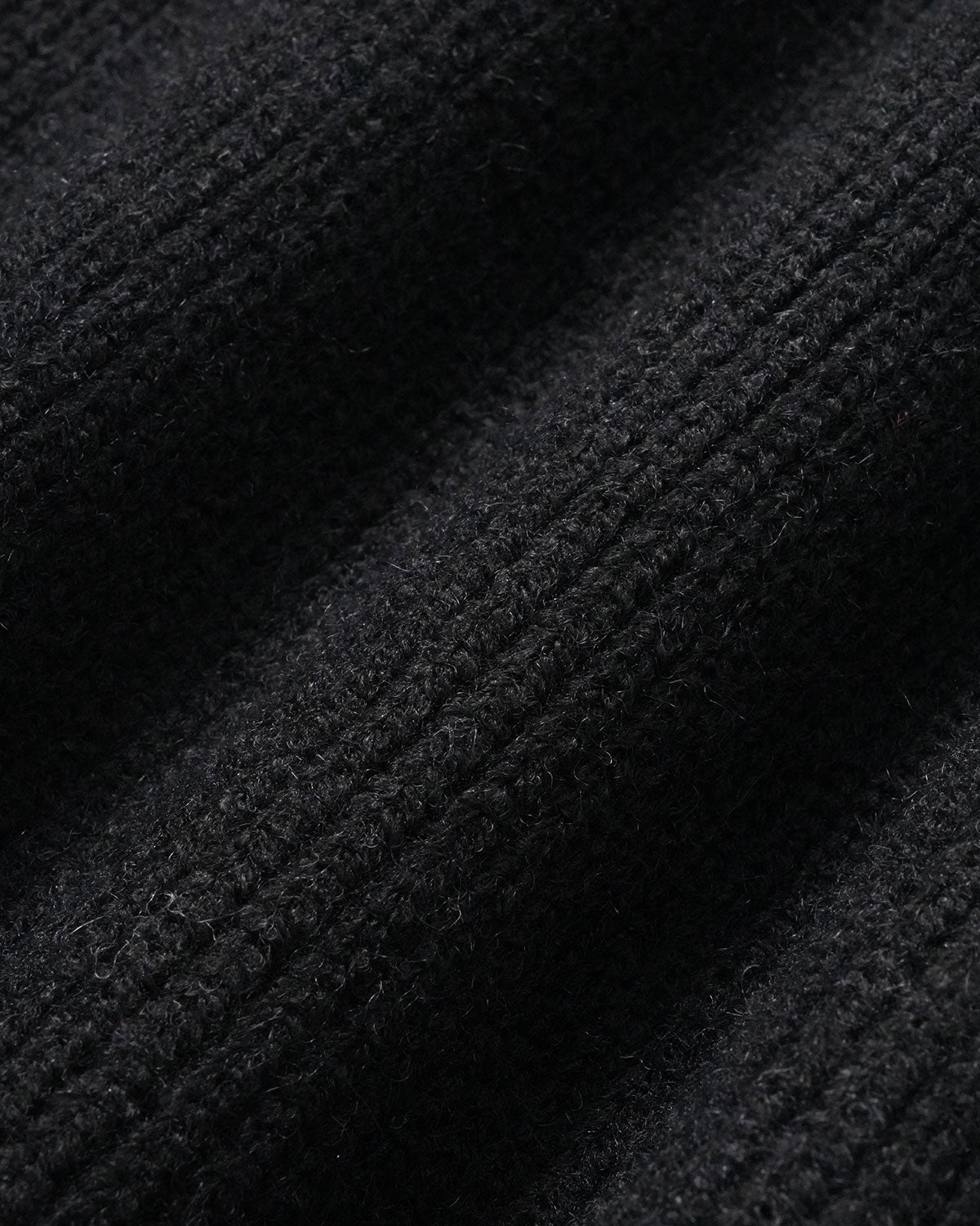 DALIA - Zwarte trui met vleermuismouwen en schildpadmotief